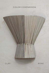 Comparison of 'Clay' and 'Bone' colors on a textured surface