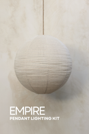 Pendant light fixture hanging against a neutral background with 'EMPIRE' branding.